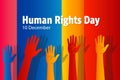 Human Rights Day Banner with Raised Hands and Rainbow Gradient Background Royalty Free Stock Photo