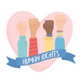 Human rights, hands raised in fist love heart strong