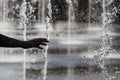 Human`s hand and fountain Royalty Free Stock Photo