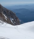 Human`s look like tiny ants against the vast glaciers of Mt Hood while climbing