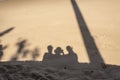 Human shadow on the beach sand Royalty Free Stock Photo