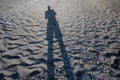 Human shadow on the sand Royalty Free Stock Photo