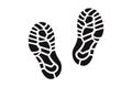 Human shoe footprints. Pair of prints from sneakers or boots. Left and right leg. Shoe sole. Walking foot steps. Black