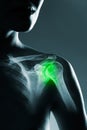 Human shoulder joint in x-ray, on gray background. Royalty Free Stock Photo