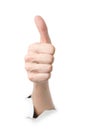 Human showing thumbs up through the paper Royalty Free Stock Photo