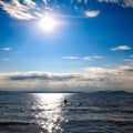 Human silhouette against the backdrop of sea