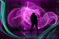 Human silhouette against backlight. Light painting Royalty Free Stock Photo