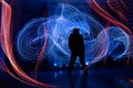 Human silhouette against backlight. Light painting Royalty Free Stock Photo