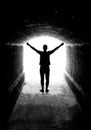 Human silhouette in tunnel exit Royalty Free Stock Photo