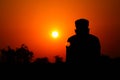 Human silhouette watching the setting sun, Satara, Maharashtra, India Royalty Free Stock Photo