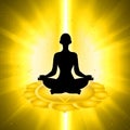 Human silhouette in yoga pose sitting on the solar plexus chakra Royalty Free Stock Photo