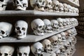 Human skulls inside a catacomb.