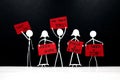 Human stick figures holding I Need Work placard. Unemployment crisis and job loss concept. Royalty Free Stock Photo