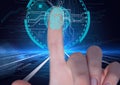 Human thumb over biometric scanner against microprocessor connections on blue background