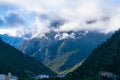 Misty mountains and human villages Royalty Free Stock Photo