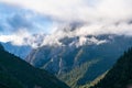 Misty mountains and human villages Royalty Free Stock Photo