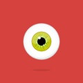 Human yellow - green eye isolated on red background. Eyeball iris pupil