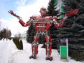 The humanoid metal funny robot the autoboat Red, is made of car spare parts, refuels gasoline, parts of body of the robot, Royalty Free Stock Photo