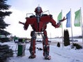 The humanoid metal funny robot the autoboat Red, is made of car spare parts, refuels gasoline, parts of body of the robot, Royalty Free Stock Photo