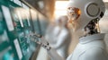 humanoid robot appears happy while analyzing data on futuristic touchscreen