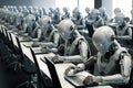 Humanoid robot office workers working on a laptop computer