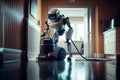 Humanoid robot with a vacuum cleaner Royalty Free Stock Photo