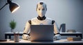 Humanoid robot working on laptop at modern office desk, artificial intelligence technology, futuristic automation concept Royalty Free Stock Photo
