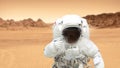 Humans on the planet Mars. Astronaut on Mars shows a thumbs-up