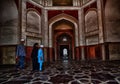 Humayun's Tomb is a grand dynastic mausoleum that was to become synonyms of Mughal architecture. T