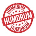 HUMDRUM text written on red round stamp sign Royalty Free Stock Photo