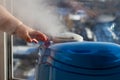 Humidifier producing a vapor with a baby`s hand Royalty Free Stock Photo