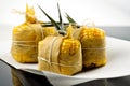 Humita, steamed wrapped corn cakes. AI generative