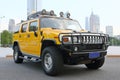 A hummer H2 ORV in Guangzhou skyline background Royalty Free Stock Photo