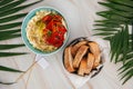 Hummus bowl with baked pepper with bread