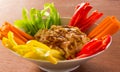 Hummus bowl with bell peppers and carrots sticks Royalty Free Stock Photo