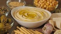 Hummus garnished with chickpeas, olive oil, spices. Hummus or fava, a hearty snack of legumes. Kosher healthy vegan food