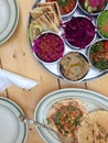 Hummus and Middle Eastern salads on a restaurant table