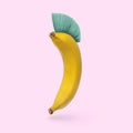 Humor is a cheerful banana with a mohawk hairstyle on a pink background.