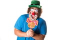 Holidays. Funny fat clown. White background. Royalty Free Stock Photo