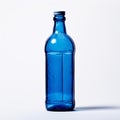 Humorous Blue Glass Bottle On White Surface