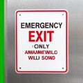 Humorous Emergency Exit Sign with Garbled Text Royalty Free Stock Photo