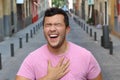 Humorous man laughing outdoors close up Royalty Free Stock Photo