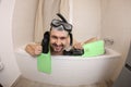 Humorous man snorkeling in the bathtub Royalty Free Stock Photo