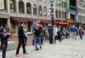 Humorous scene with street performer carrying sightseer into show,Faneuil Hall,Boston,December,2014