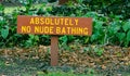 Humorous sign near a beach in Hawaii Royalty Free Stock Photo