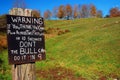 A humorous sign warns potential tresspassers to stay off the property Royalty Free Stock Photo