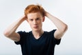 Humourless red-haired man looking seriously Royalty Free Stock Photo