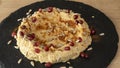 Humus with pomegranate seeds on a plate