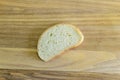 Hunch white bread on wooden board