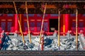 A steaming joss aroma incense sticks or candle in the censer Lingbao temple in Hunchun city of province Jilin of China. Popular